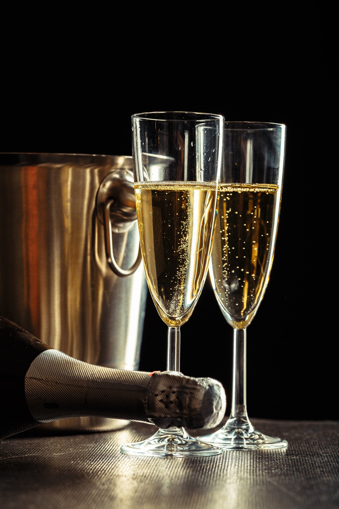 Champagne on the black background