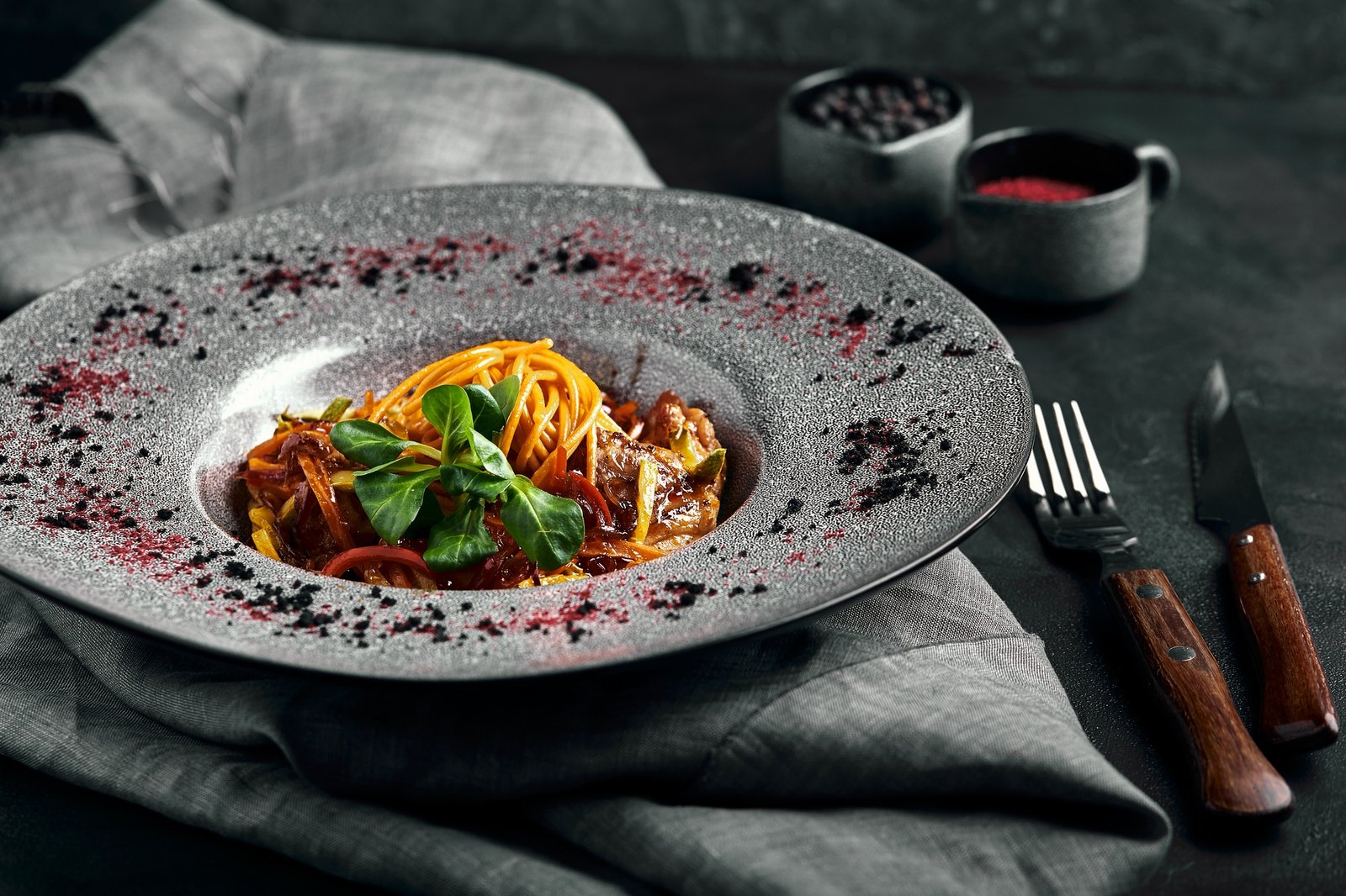 Spaghetti with vegetables tomato sauce and meat. Traditional italian food. Food photo. Dish from the